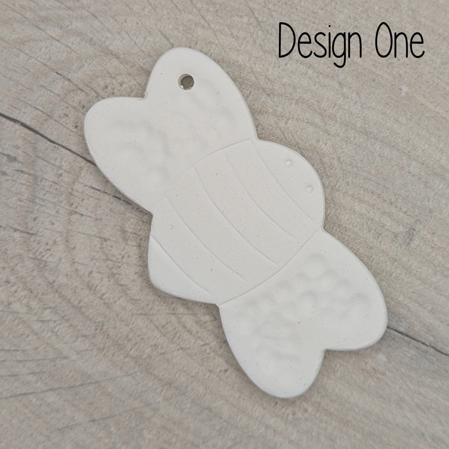 clay bee shaped decoration