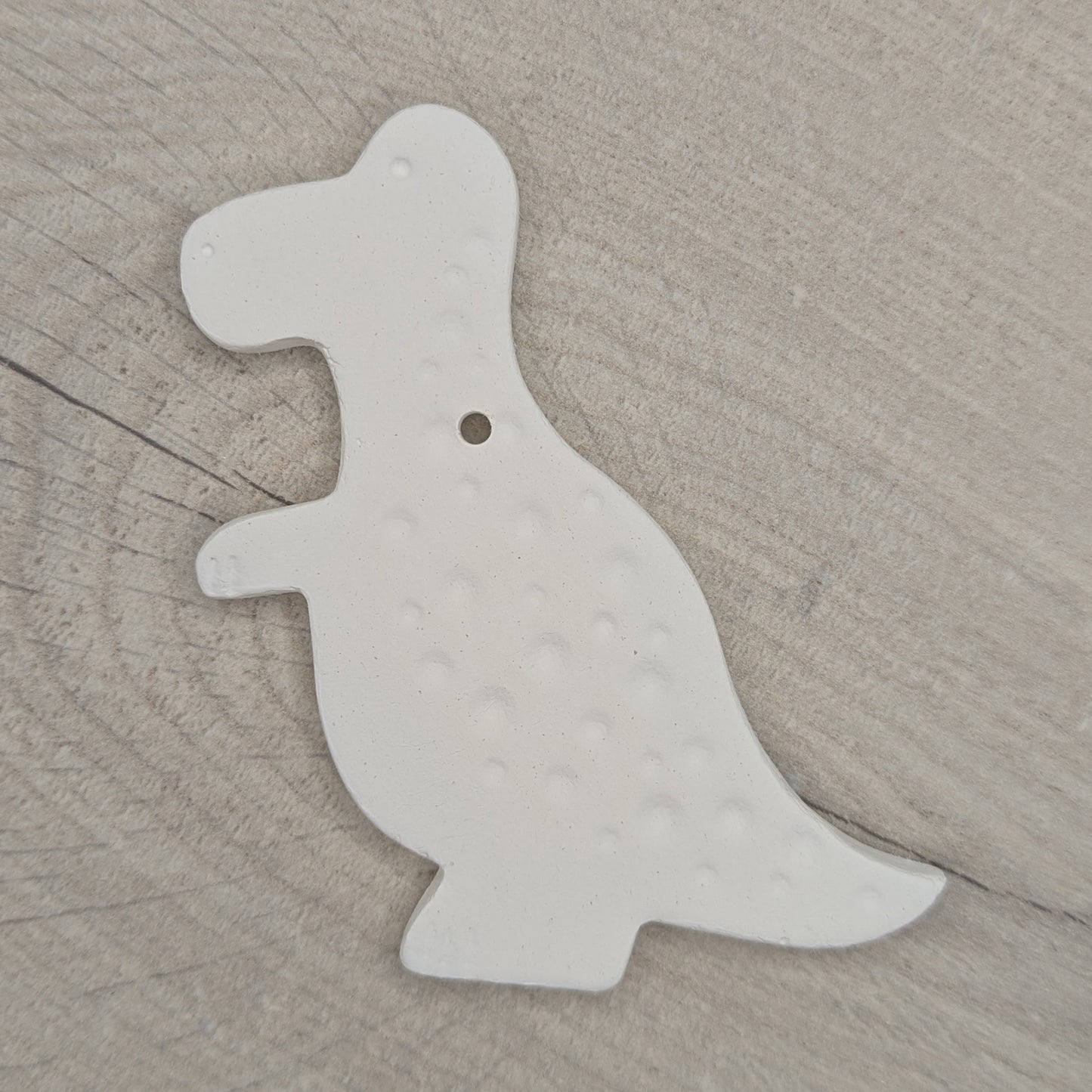 air dried clay Tyrannosaurus dinosaur decoration, with added spotted pattern