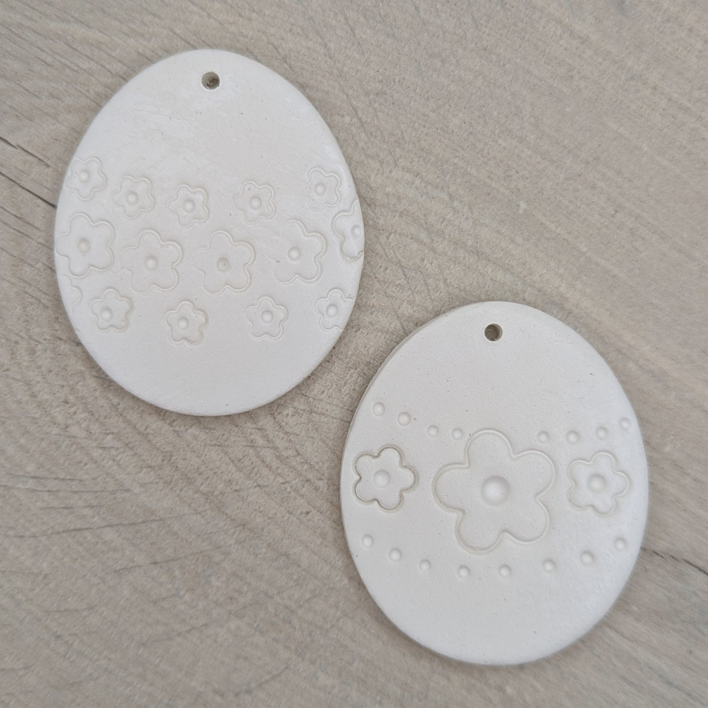 pair of flower design easter egg clay decoration to shown different designs