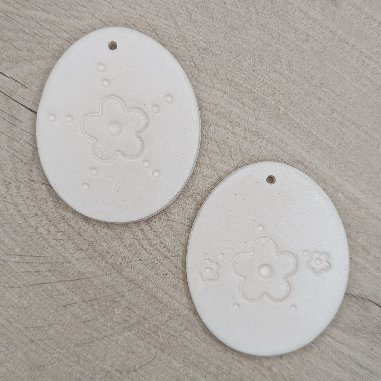 pair of flower design easter egg clay decoration to shown different designs