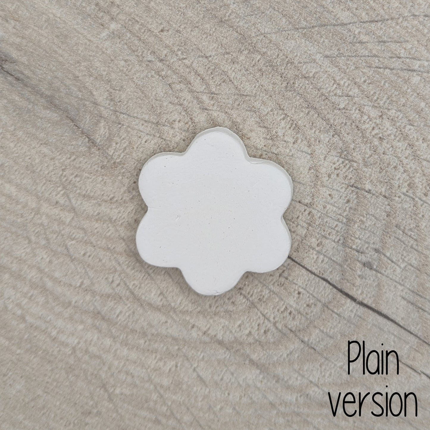small plain flower shaped air dried clay decoration