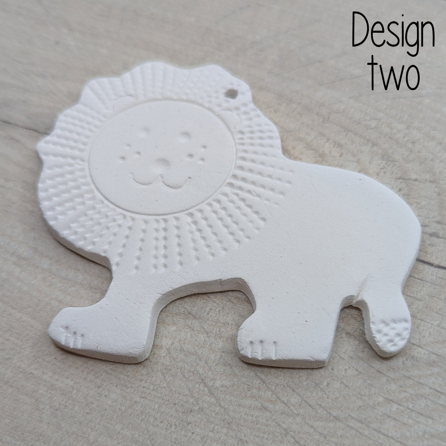 clay decoration of the patterned lion design