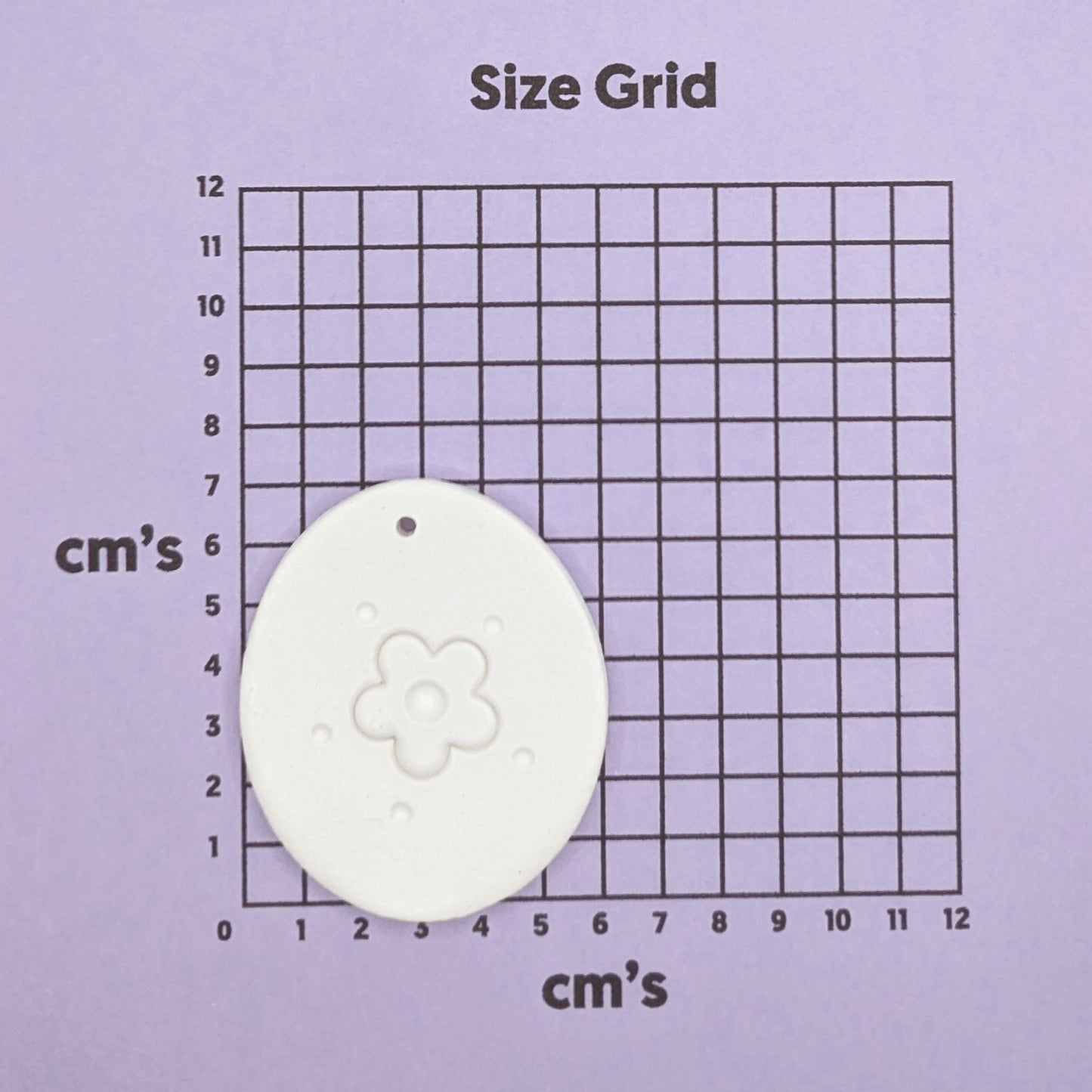 flower easter egg on size grid to show size