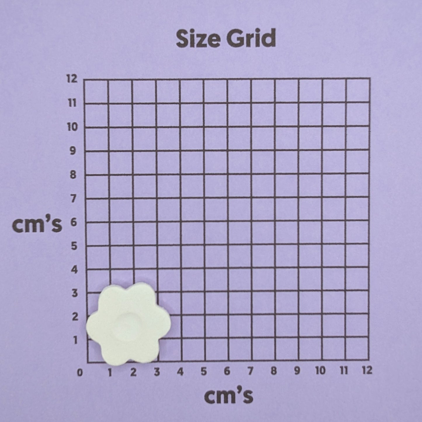 small flower clay decoration on size grid