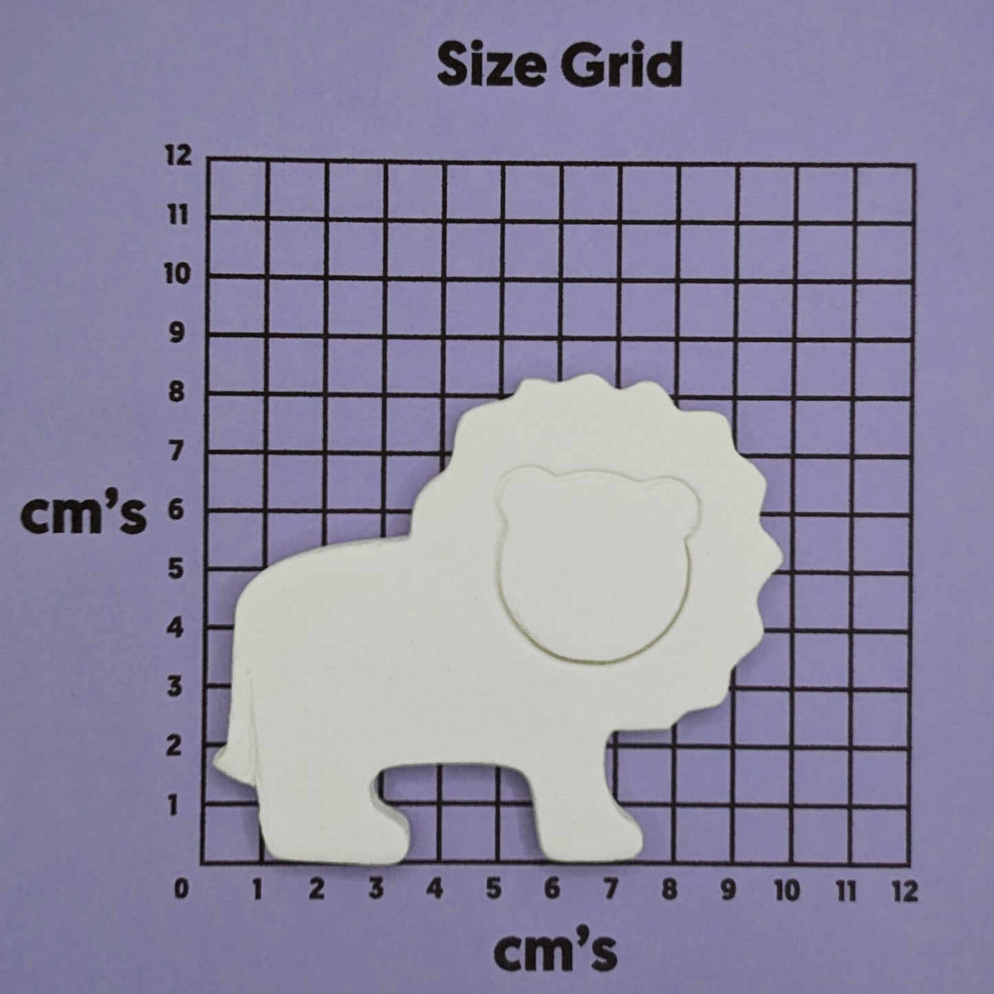 White lion-shaped decoration on a size grid with centimeter measurements on a purple background