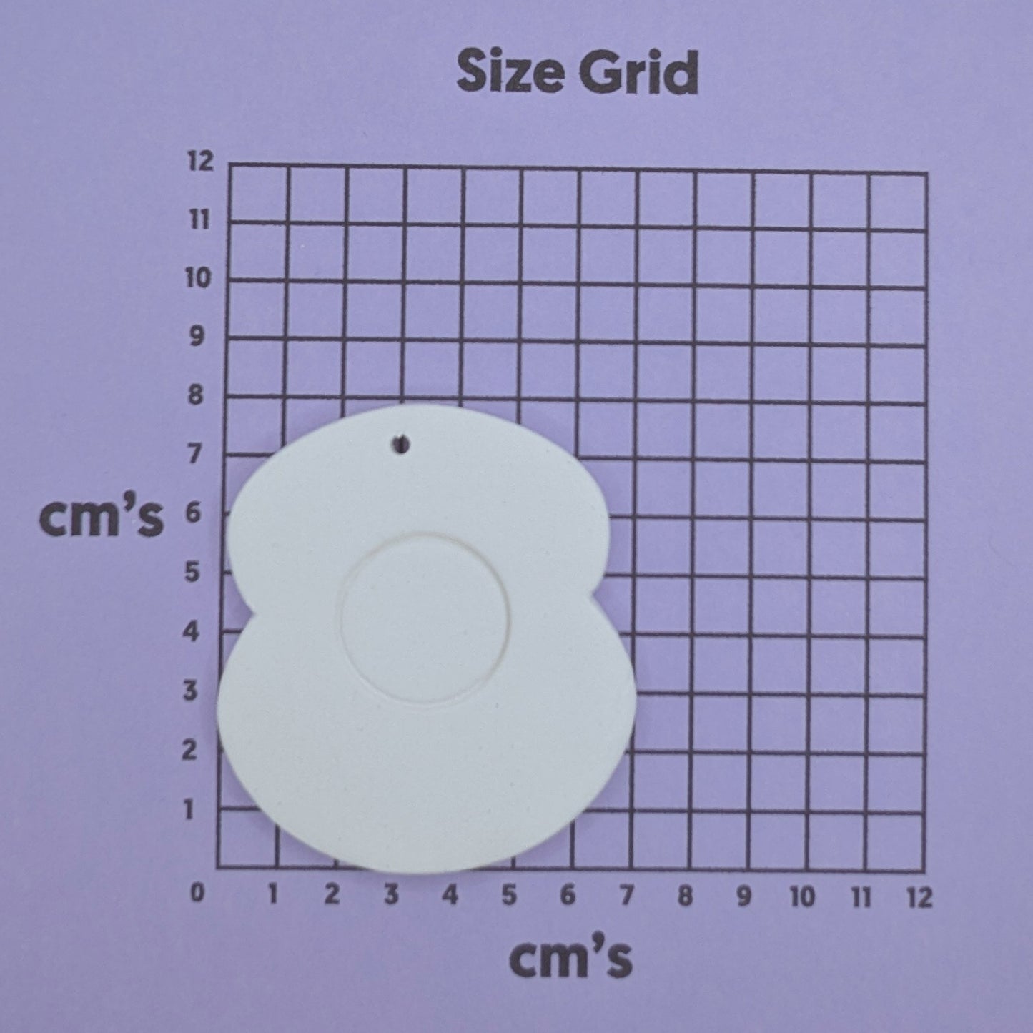 Size grid with a poppy decoration on to show size