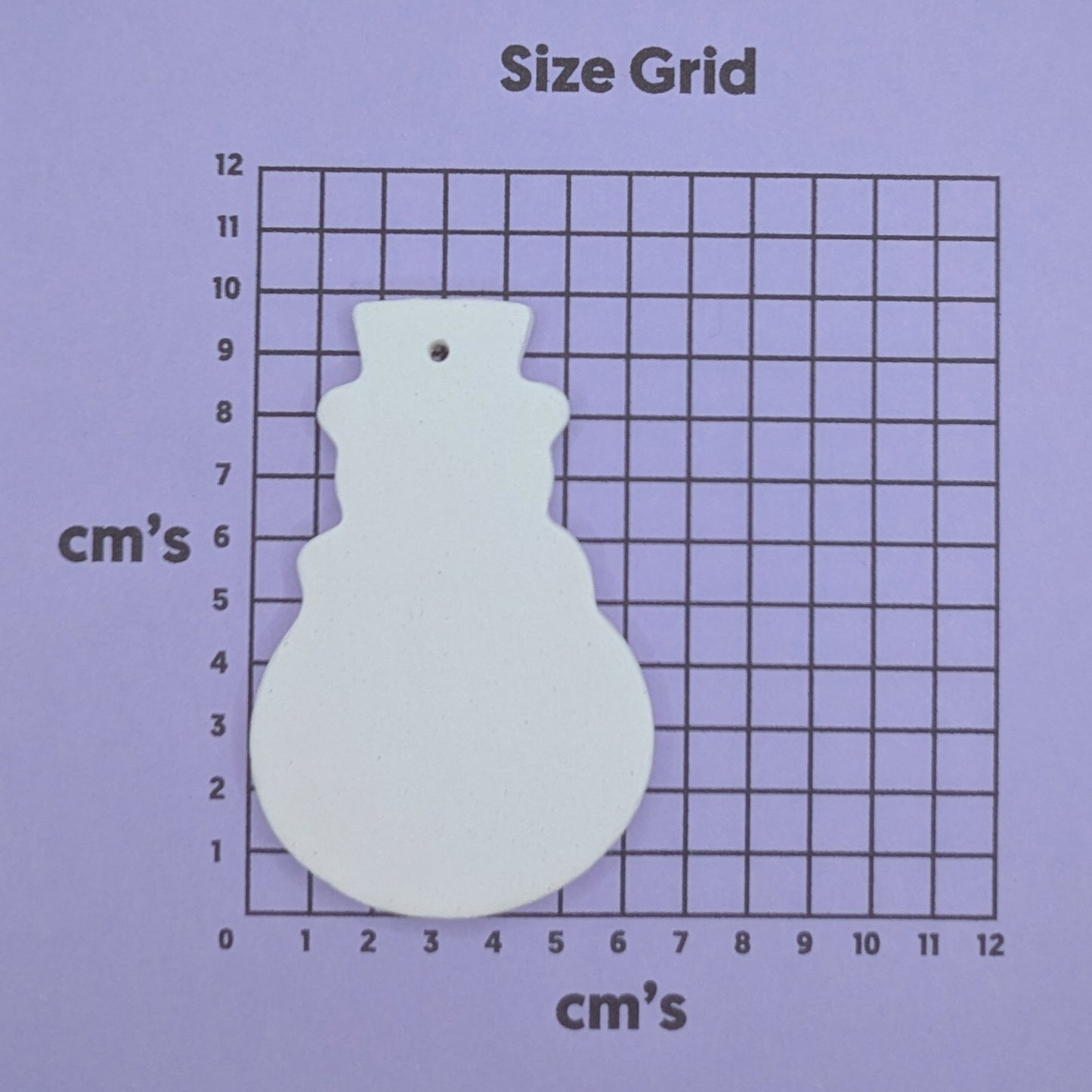snowman on a size grid with measurements in centimeters