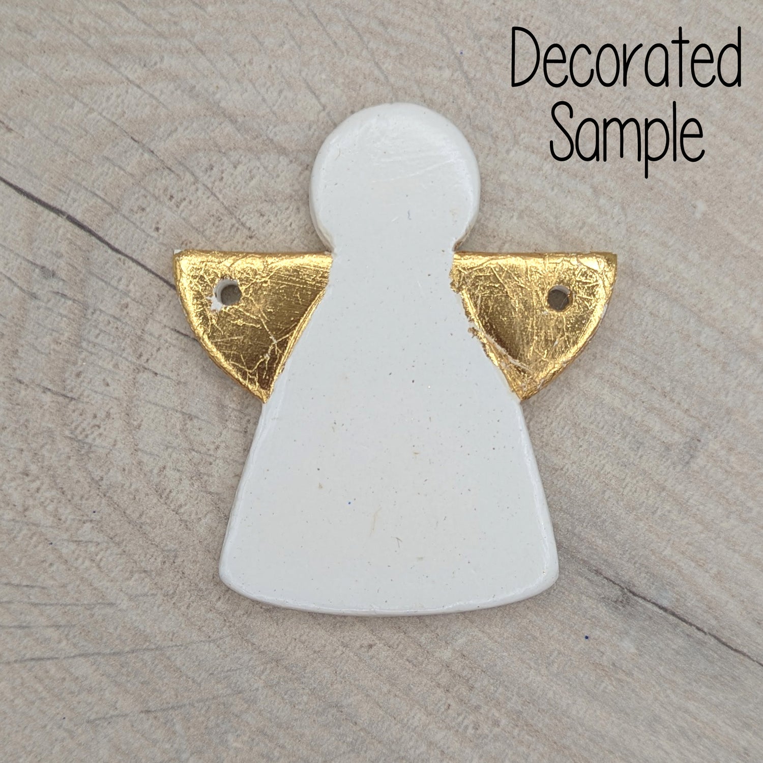 White clay angel ornament, with gold foil on wing area