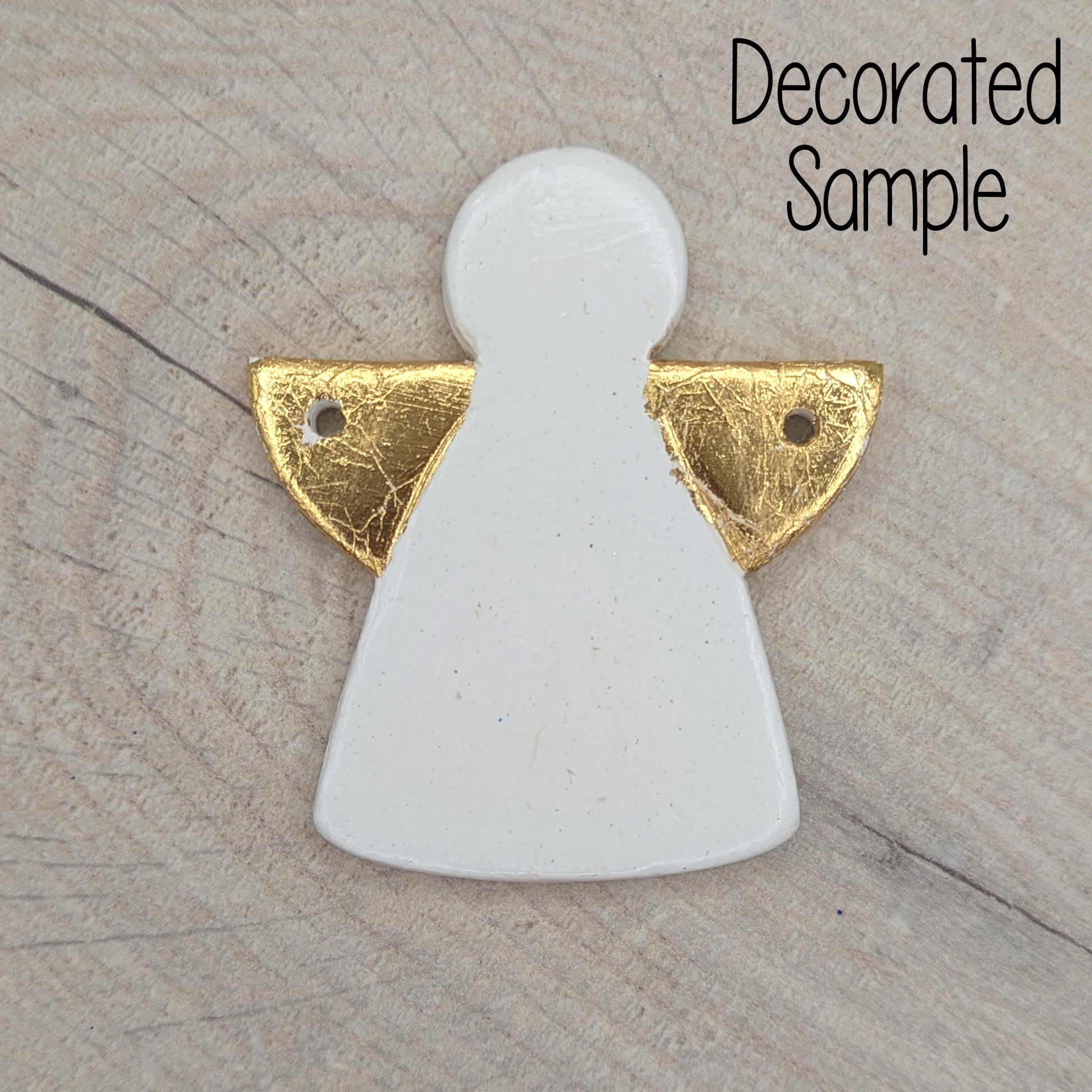 White clay angel ornament, with gold foil on wing area