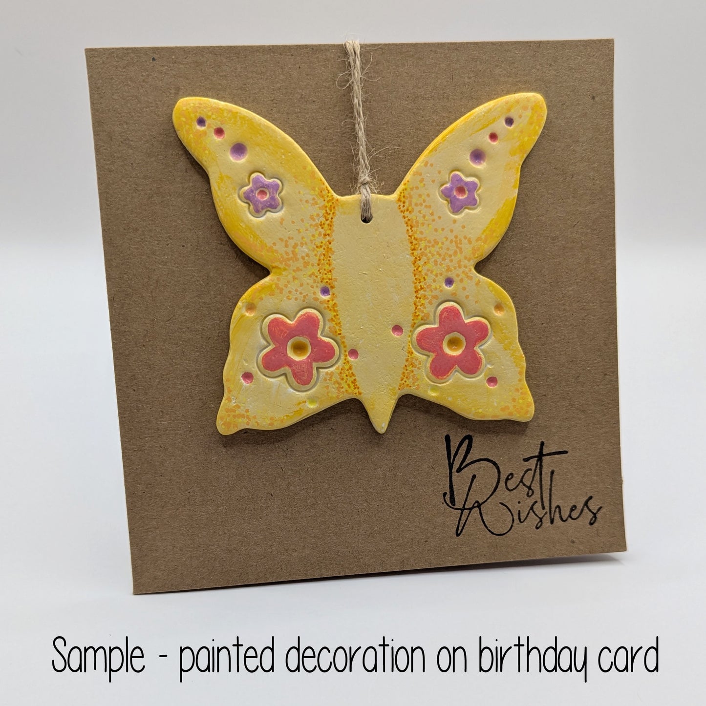 best wishes card with large yellow painted clay butterfly on the front