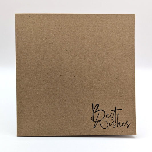 best wishes stamped in black ink onto a kraft card