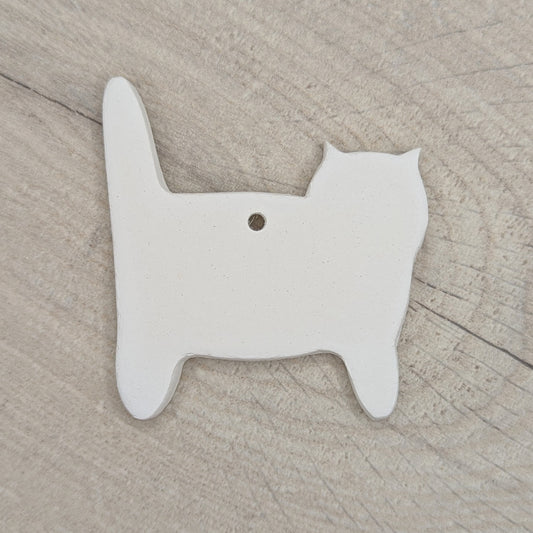 side view of cat, air dried clay decoration to paint and decorate at home or school