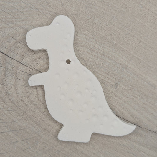 air dried clay Tyrannosaurus dinosaur decoration, with added spotted pattern