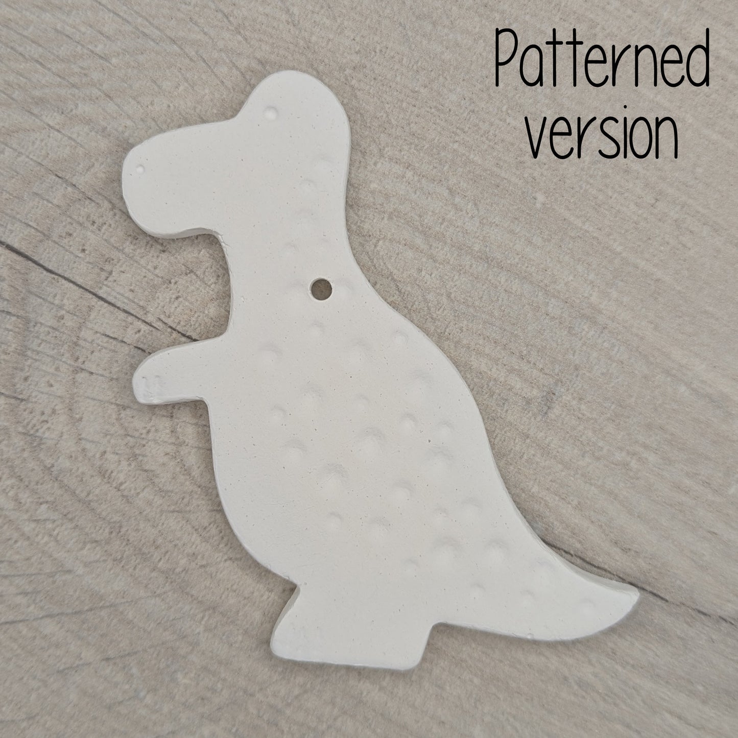 air dried clay Tyrannosaurus dinosaur decoration, with added spotty pattern