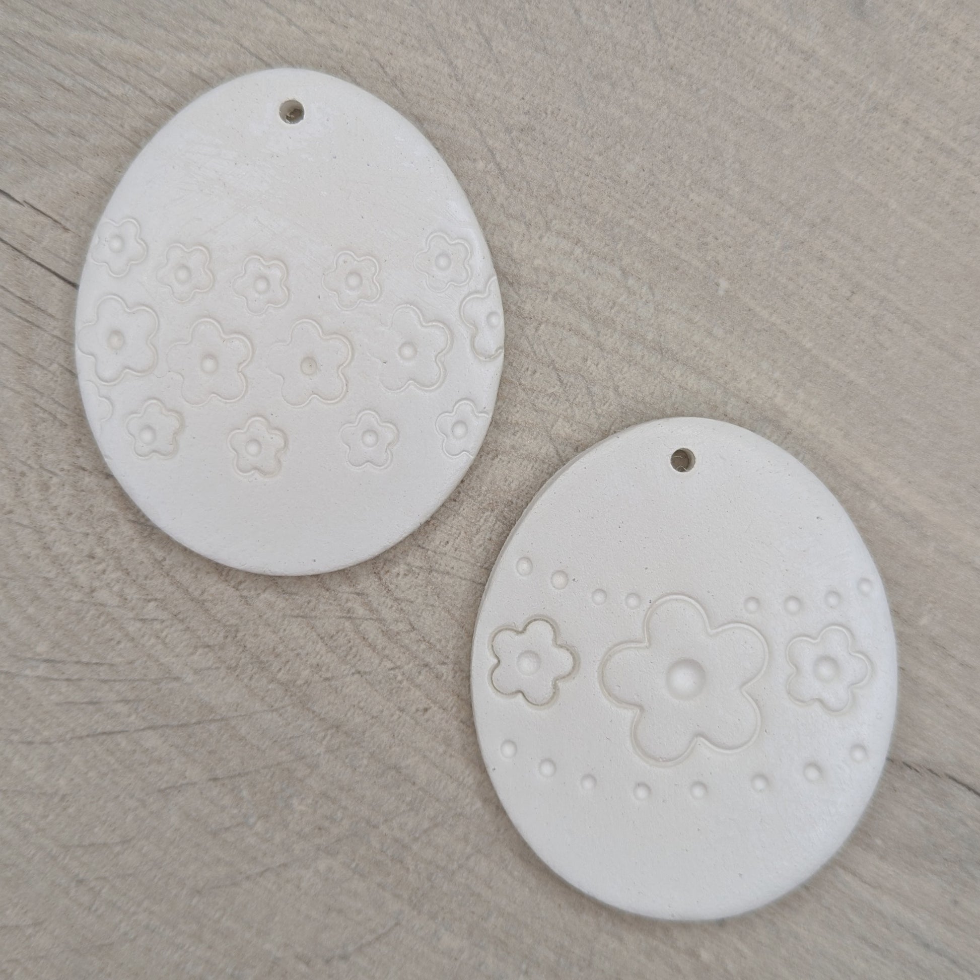 pair of flower design easter egg clay decoration to shown different designs