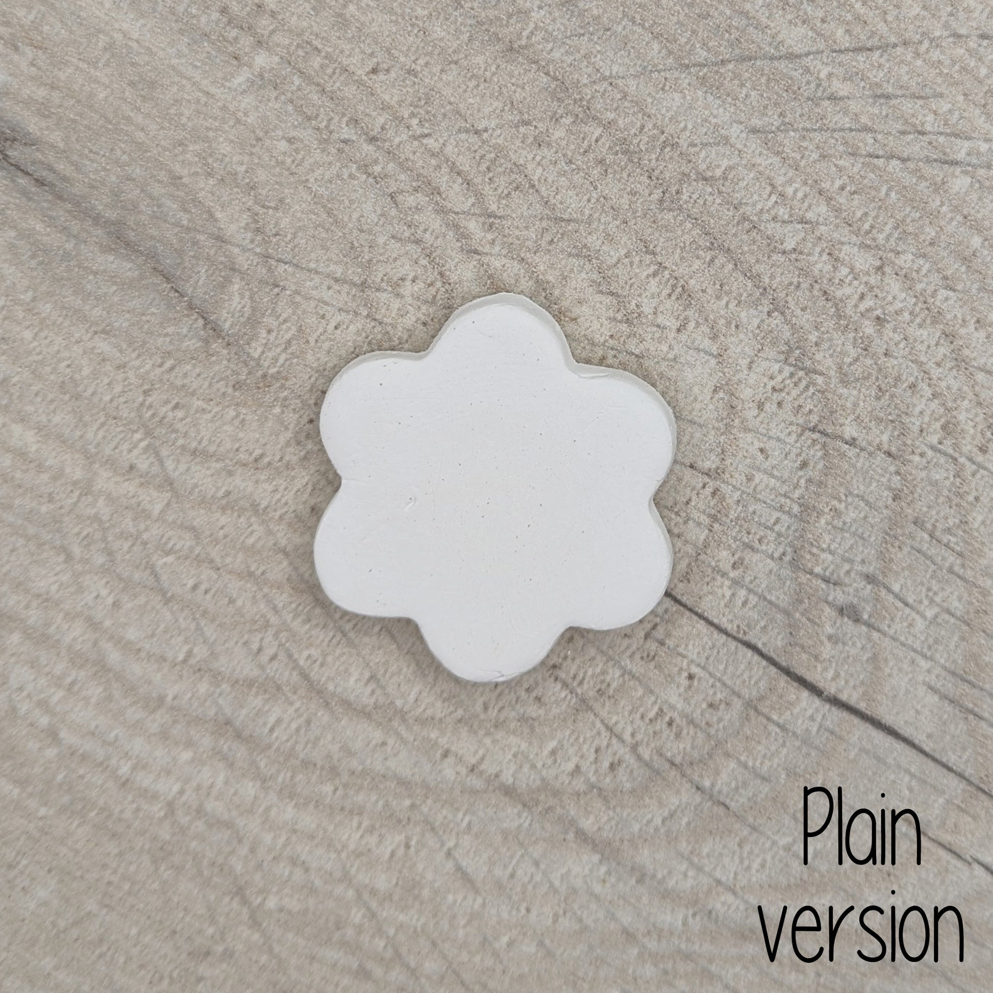 small plain flower shaped air dried clay decoration