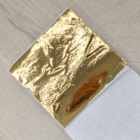 Gold leaf sheet on a textured surface