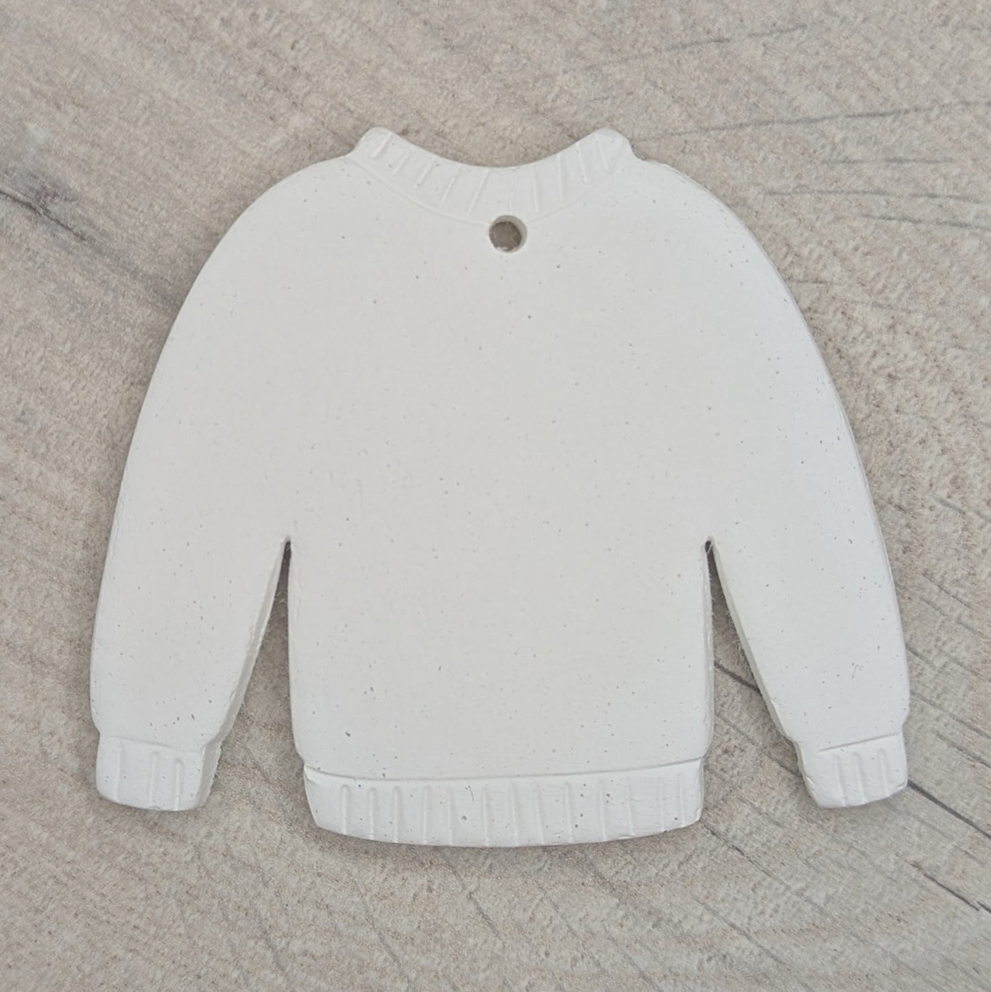 jumper clay decoration with detail / pattern around the cuffs, neck line and hem area, made of air dried clay
