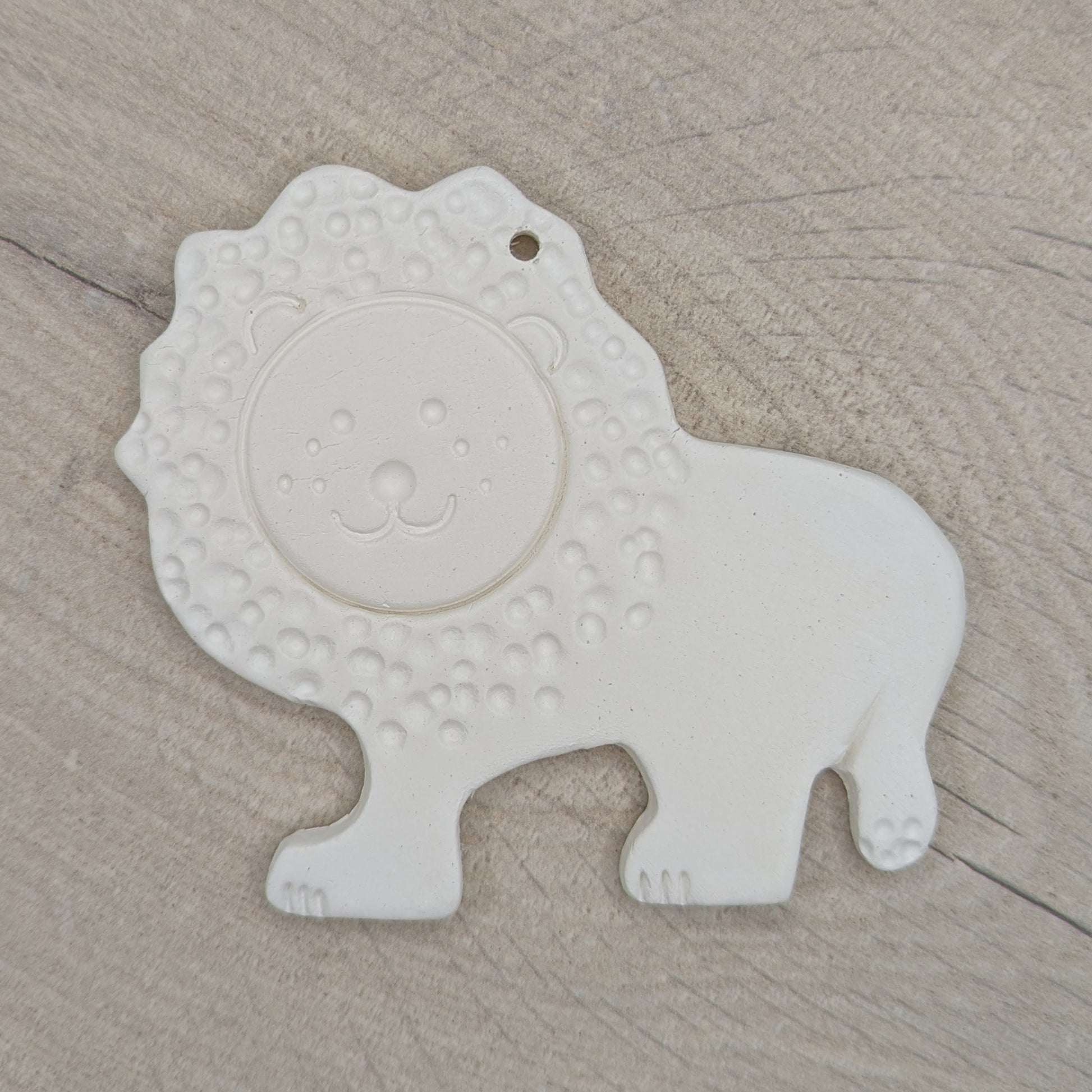 clay decoration of a lion, patterned version