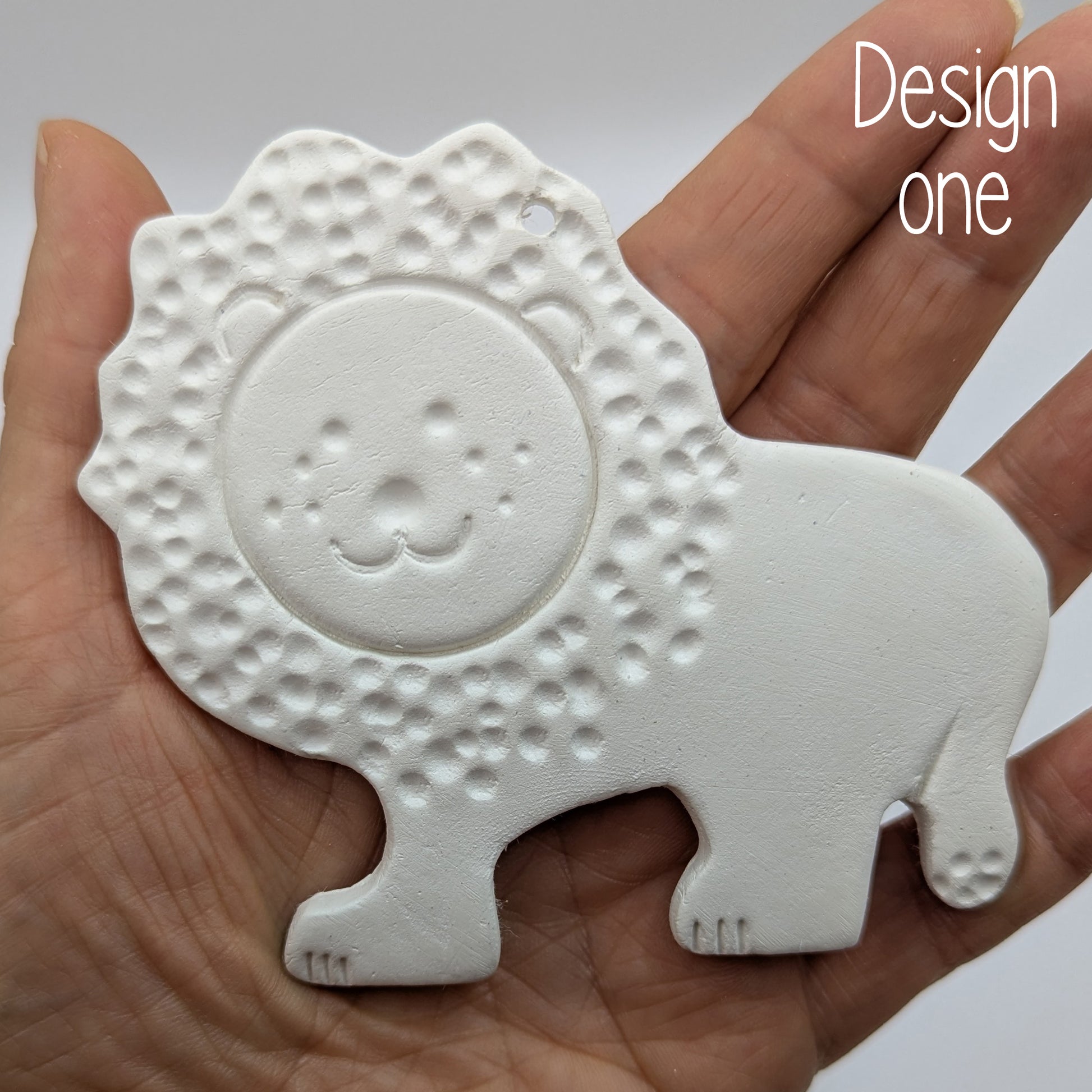 lion air dried clay decoration shown in some ones hand to show size
