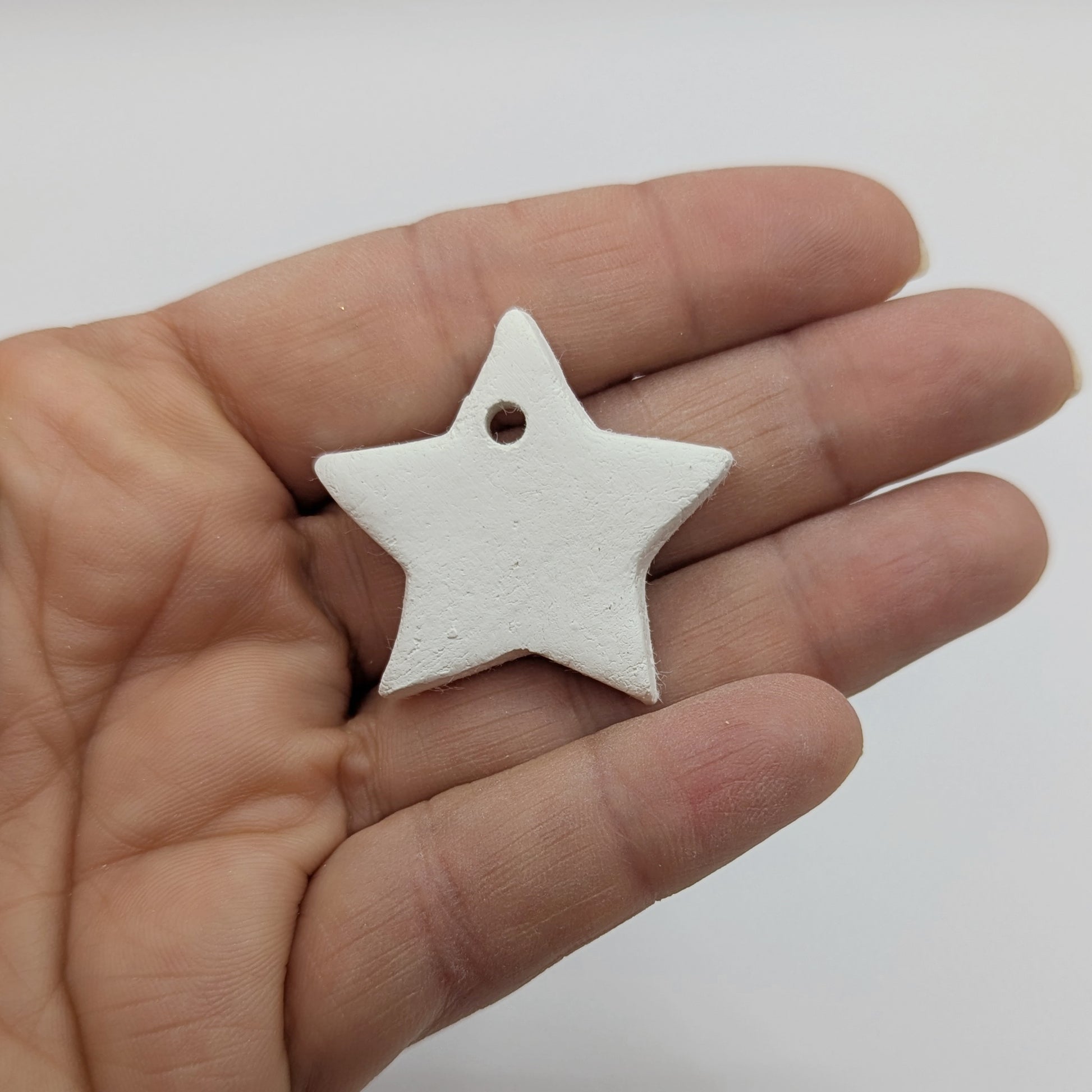 mini star shown in palm of hand