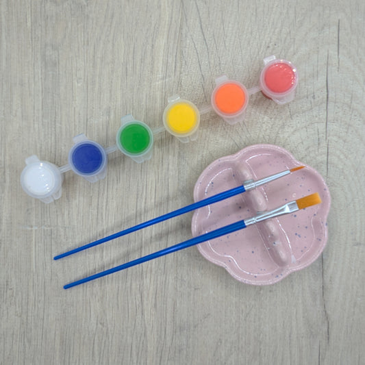paint kit, 6 small pots of paint,white, blue,  green, yellow, orange, red and two paint brushes