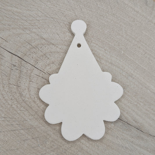 santa face and hat shaped clay decoration