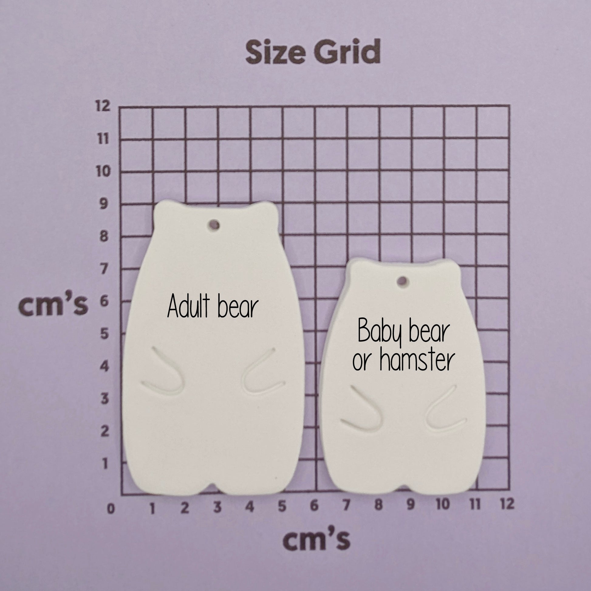 Size grid with 'Adult bear' and 'Baby bear or hamster' shapes on a purple background