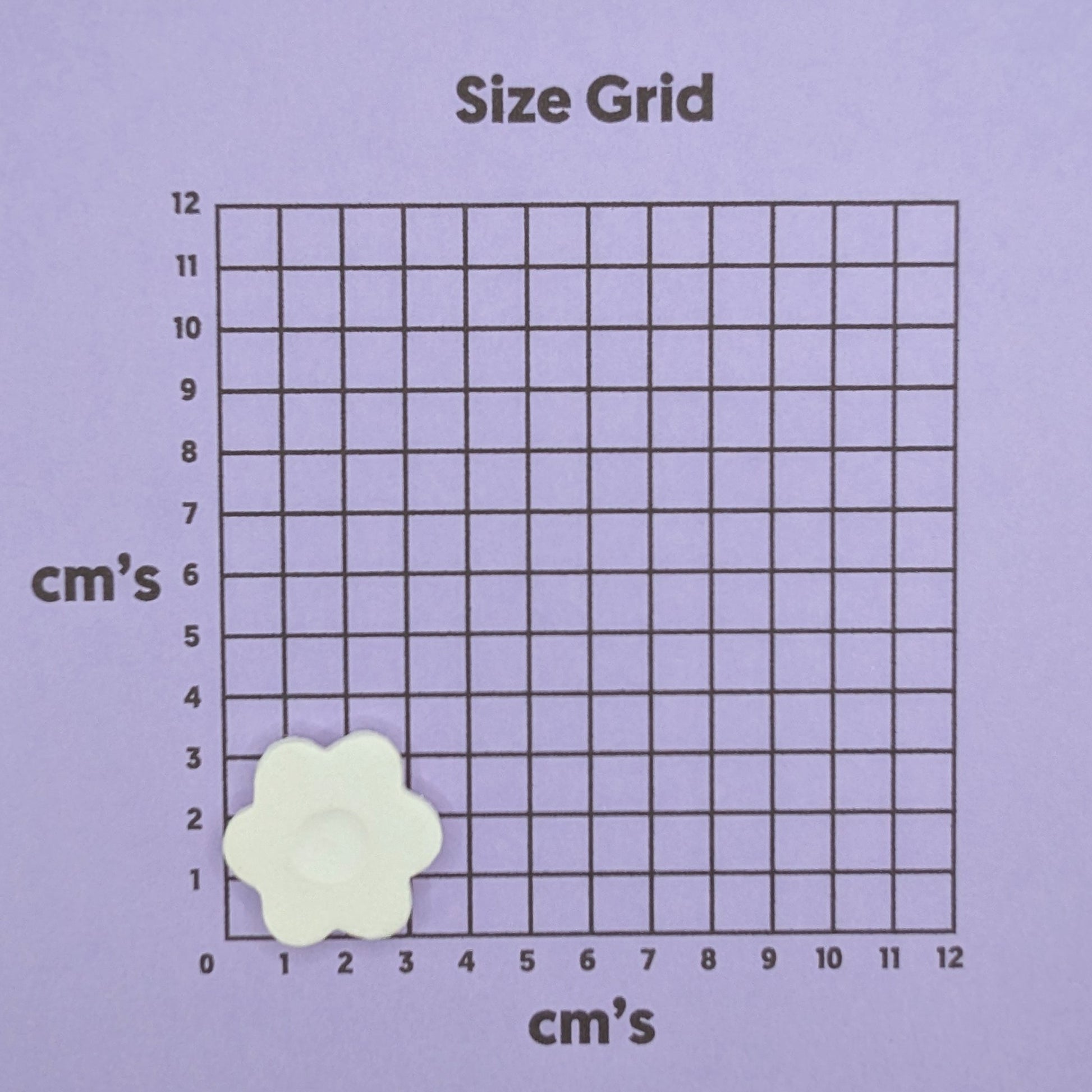 small flower clay decoration on size grid