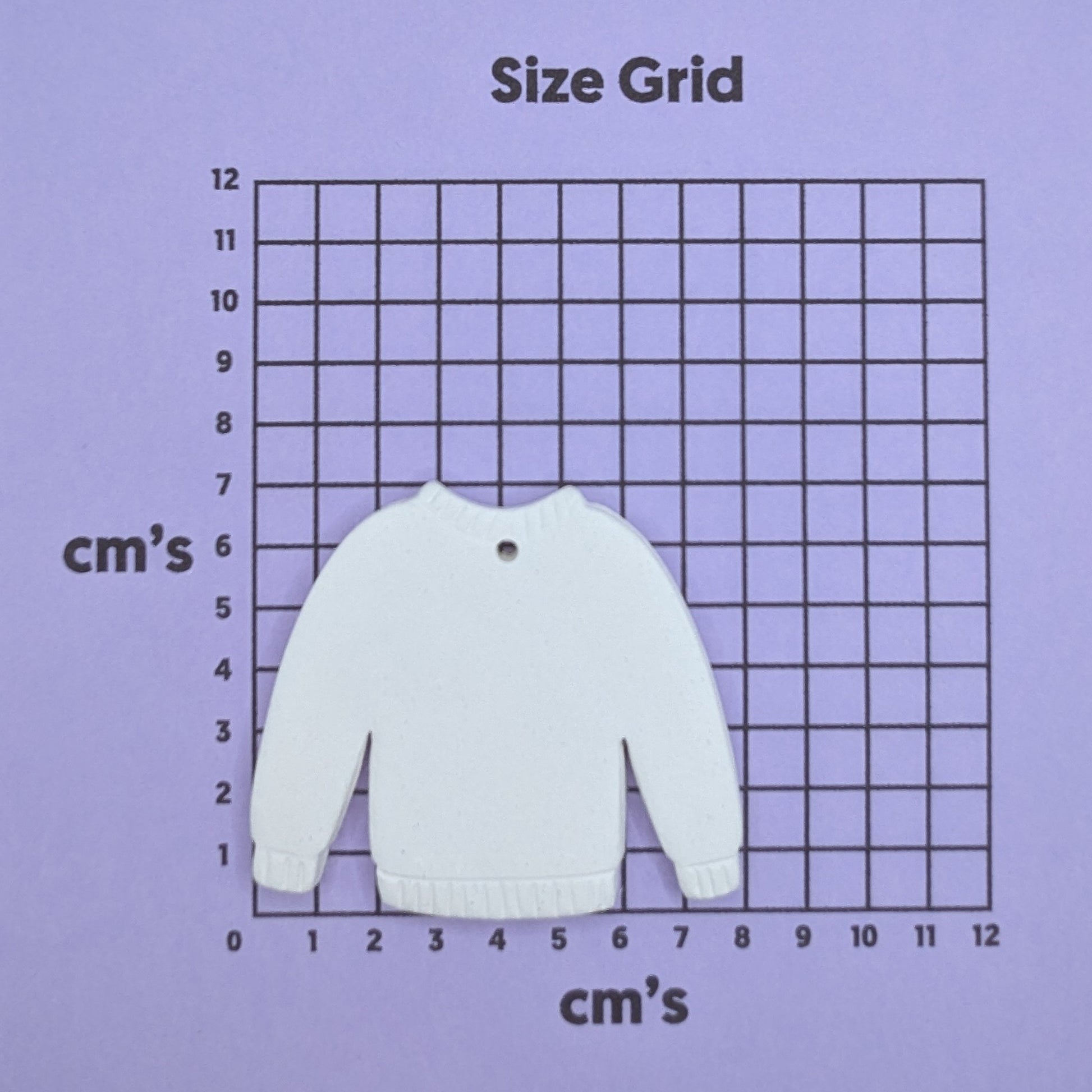 clay jumper decoration on a size grid with measurements in centimeters 