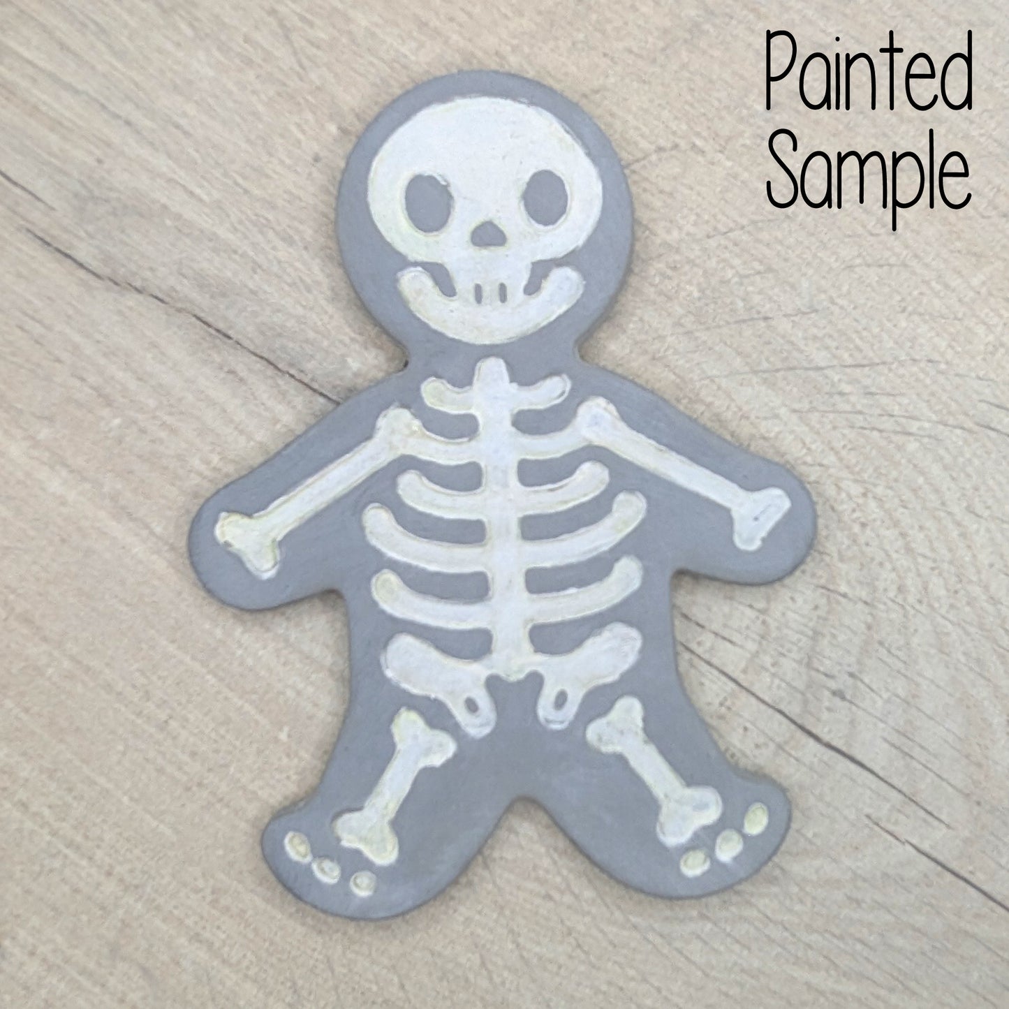 painted example of a skeleton, painted with glow in the dark paint in the bone areas