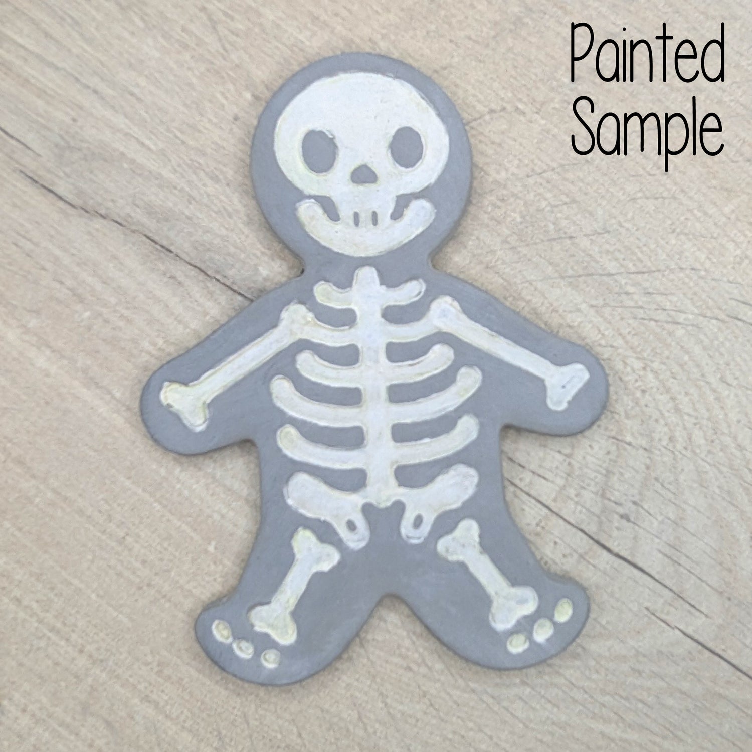 painted example of a skeleton, painted with glow in the dark paint in the bone areas