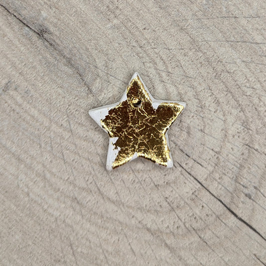 tiny gold foiled, air dried clay star