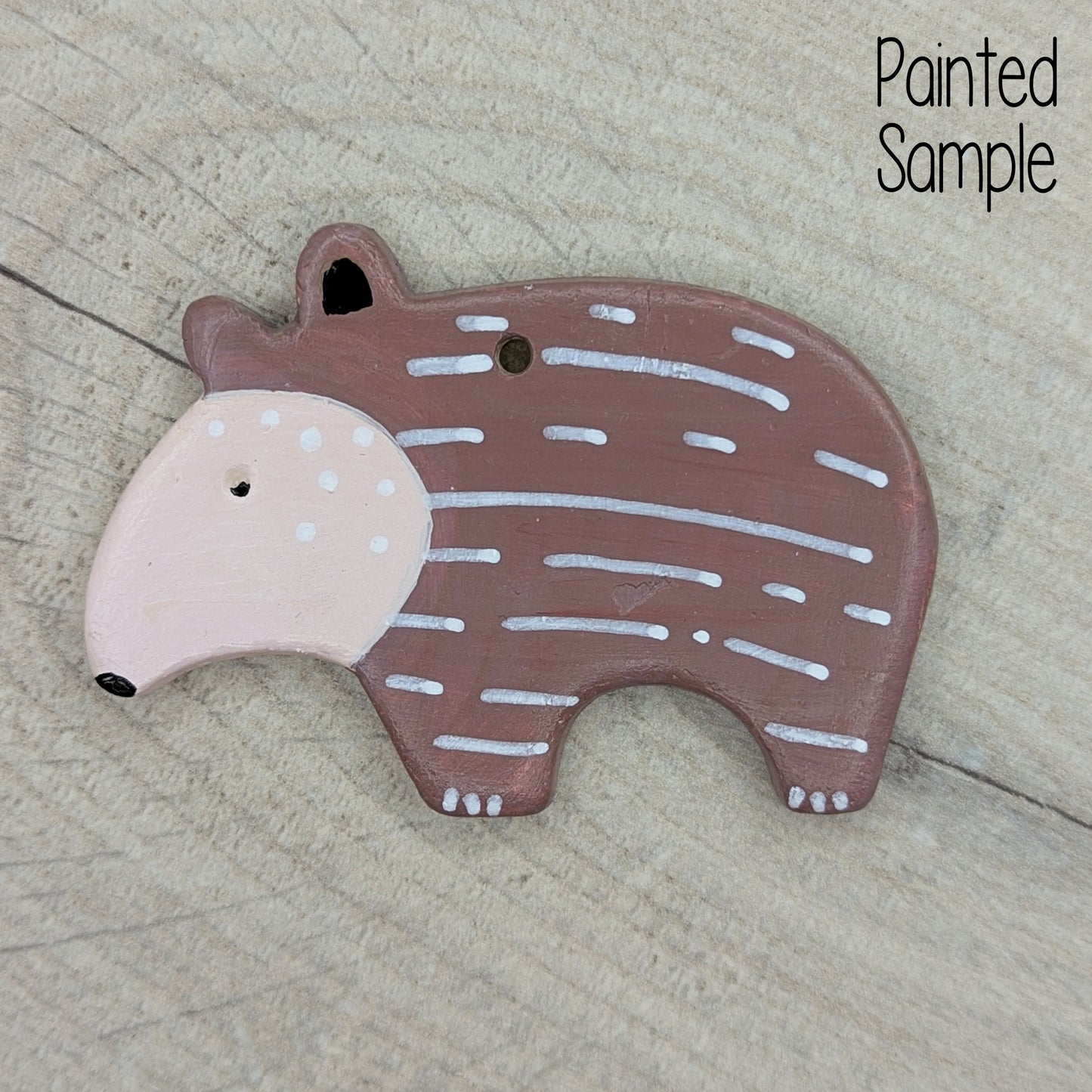 painted baby tapir, in brown and beige, made of air dried clay 