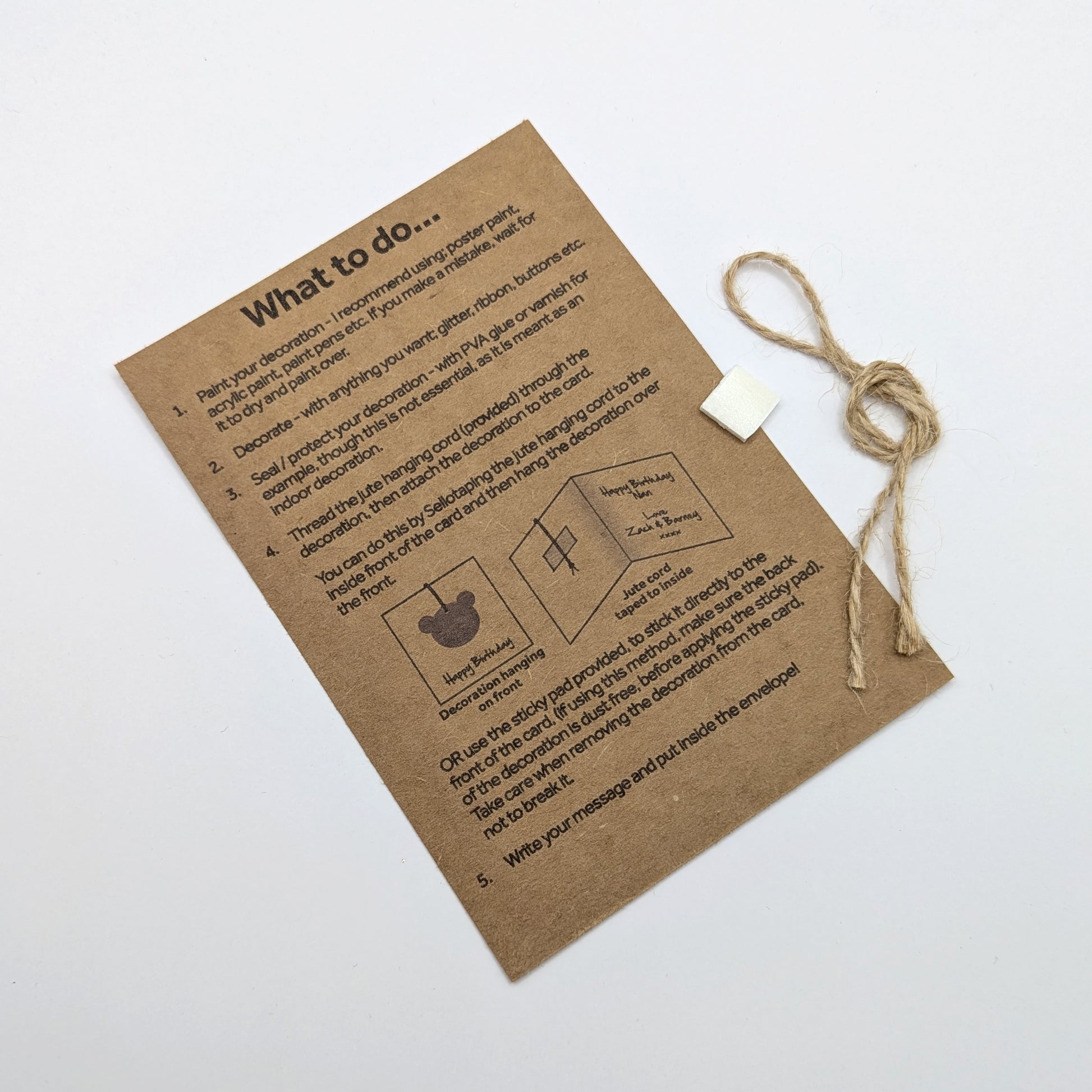 information card that goes in with my cards, explaining how to paint and attach you decoration, also shows sticky pad and jute hanging cord