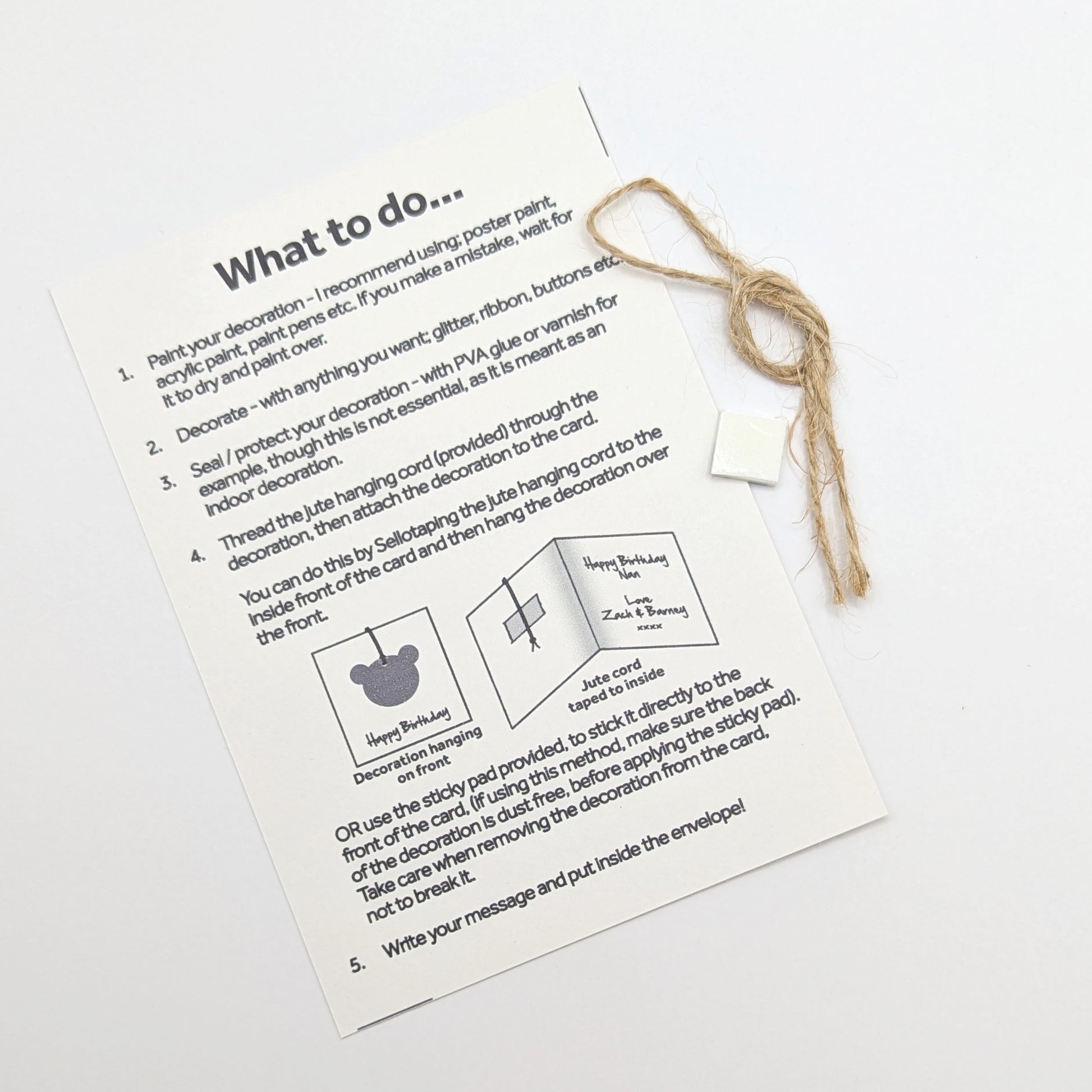 information card that goes in with my cards, explaining how to paint and attach you decoration, also shows sticky pad and jute hanging cord