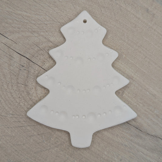 white air dried clay Christmas tree decoration with tinsel pattern stamped into the clay